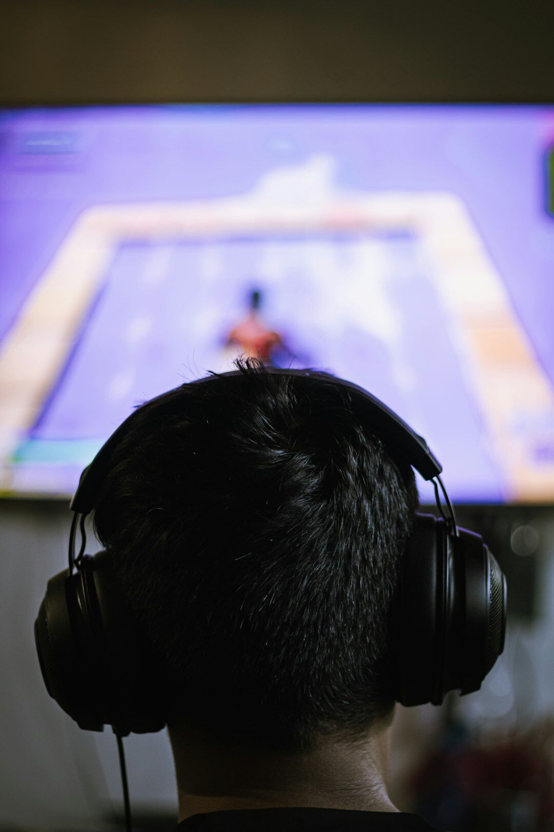 Broadcast engineer monitoring live signal feeds on screens