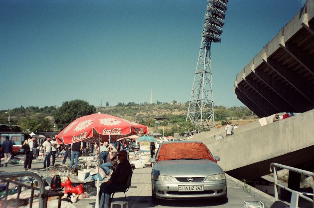 Outside broadcast van with satellite dish parked at an event